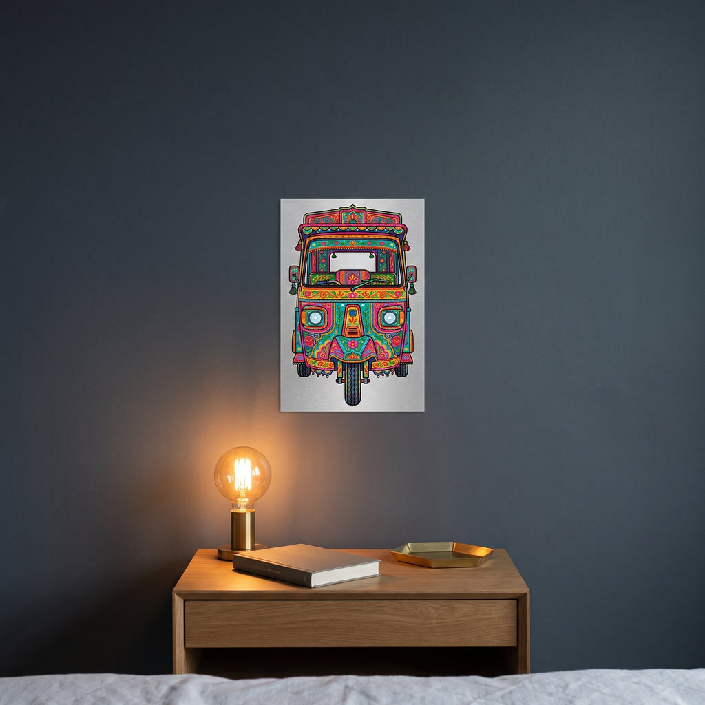 Colorful Pakistani auto rickshaw metal sign styled on a cozy bedroom wooden nightstand under a warm, glowing bedside lamp.