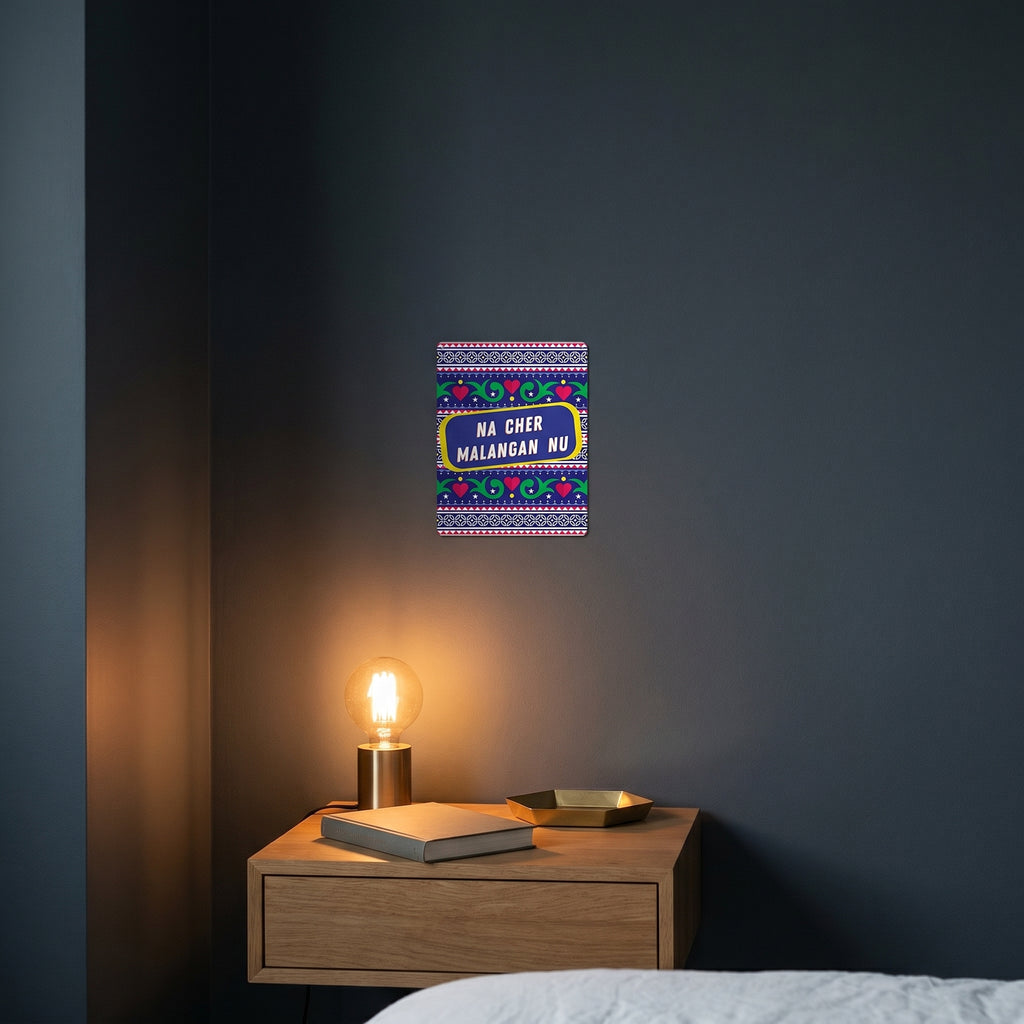 Contemporary bedroom nightstand with the Na Cher Malangan Nu framed poster catching warm ambient light from a lamp.
