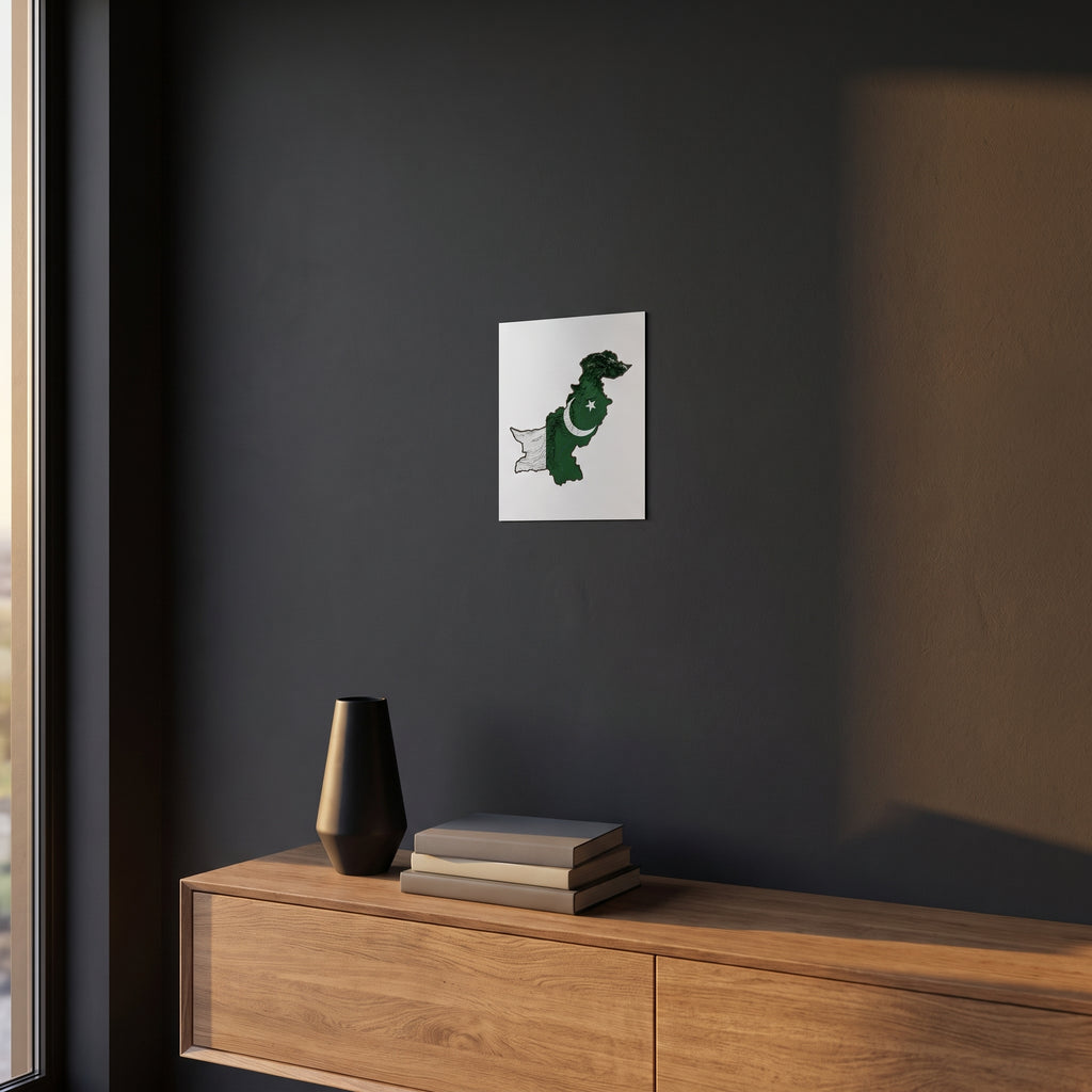 Modern 3D terrain map of Pakistan print displayed on a dark charcoal grey accent wall over a sleek wooden console floating cabinet.