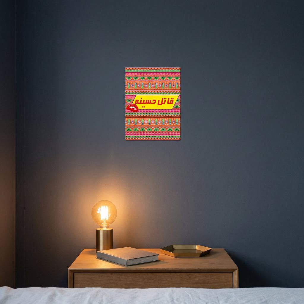 Pop-art style Qatil Haseena metal print catching warm ambient light from a lamp on a contemporary dark bedroom nightstand.