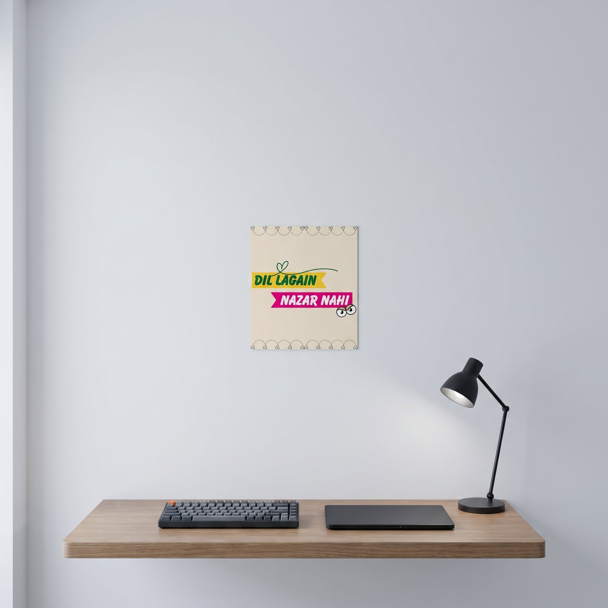 Vibrant Desi culture poster hanging gracefully on a crisp white wall behind a clean, modern minimalist home office desk setup.
