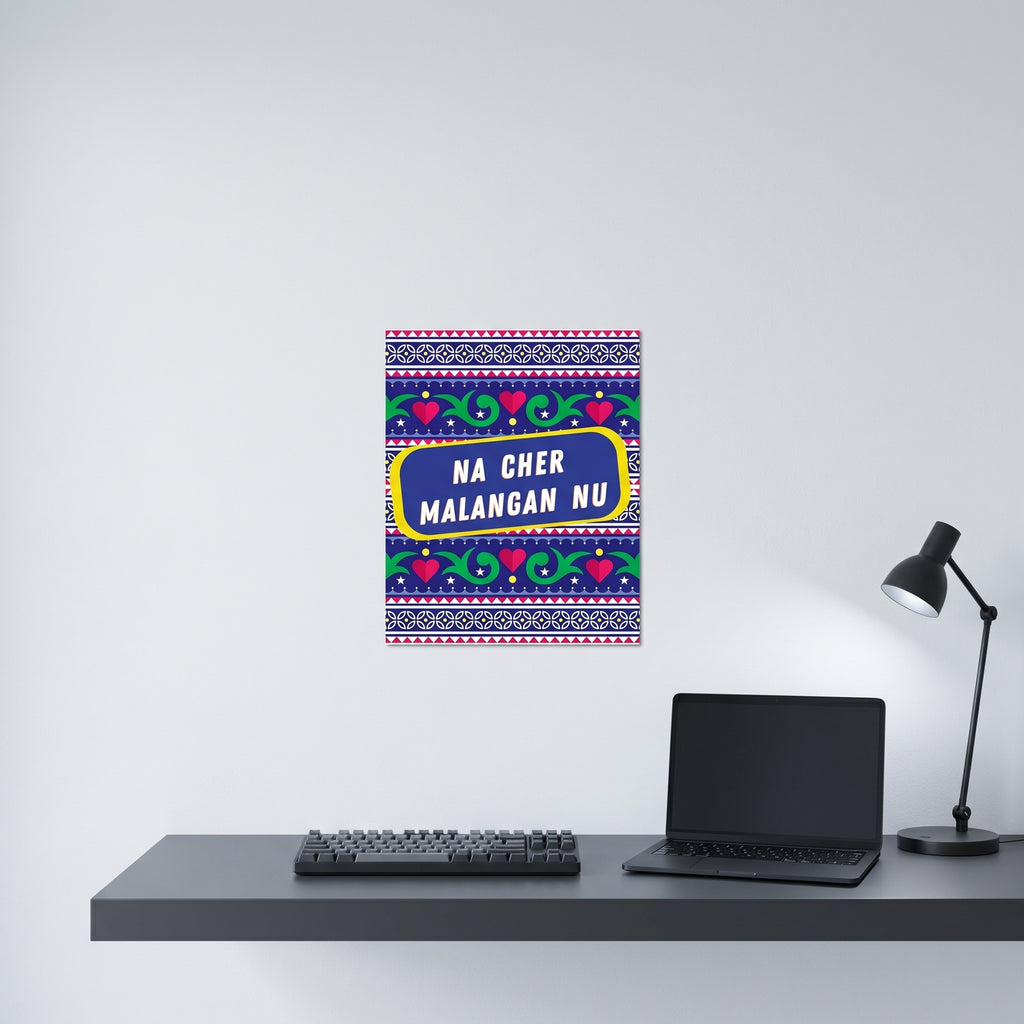 Vibrant South Asian culture poster hanging on a clean white wall behind a modern minimalist home office desk setup.
