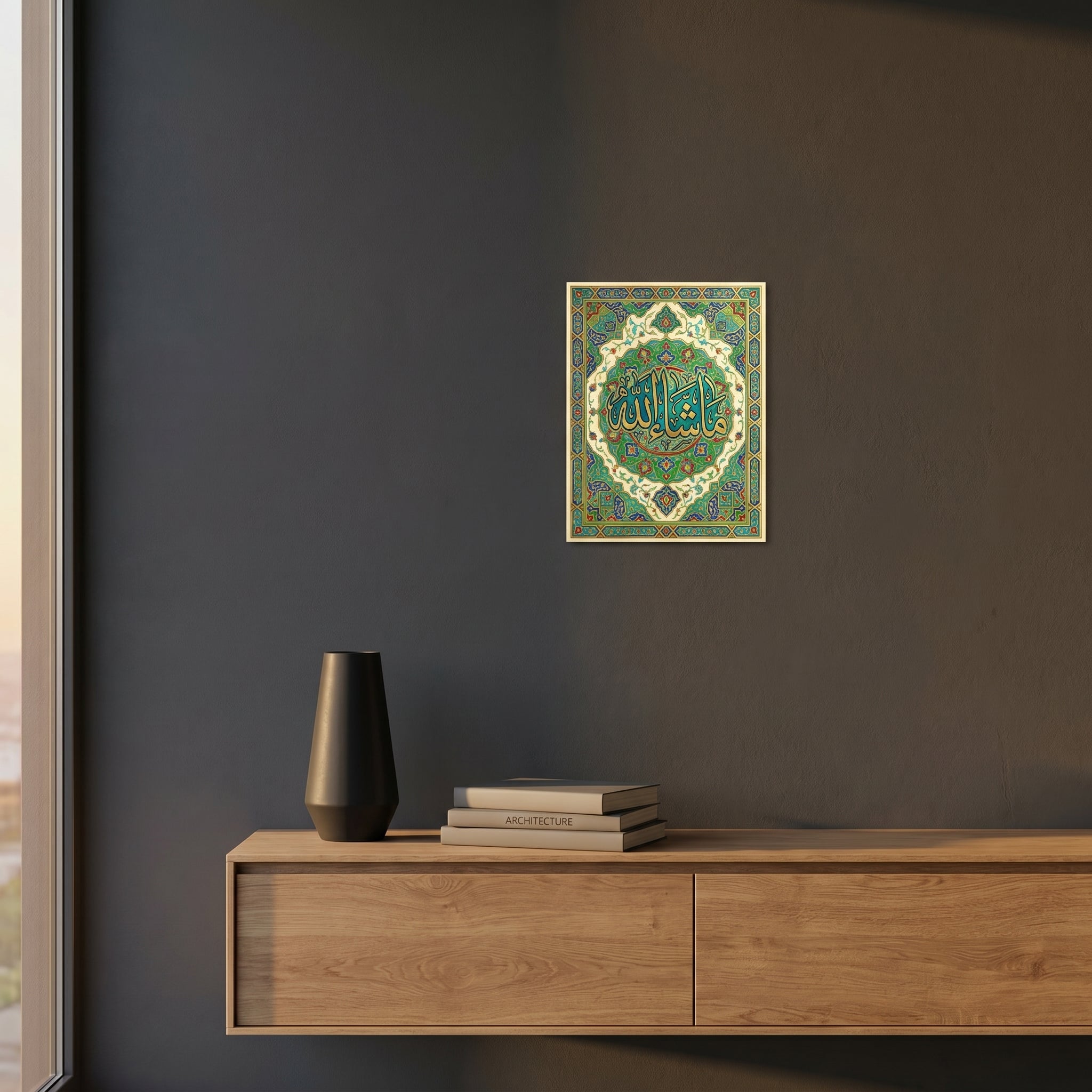 Vibrant emerald green Arabic typography print catching warm ambient light above a dark wooden bedroom nightstand setup.