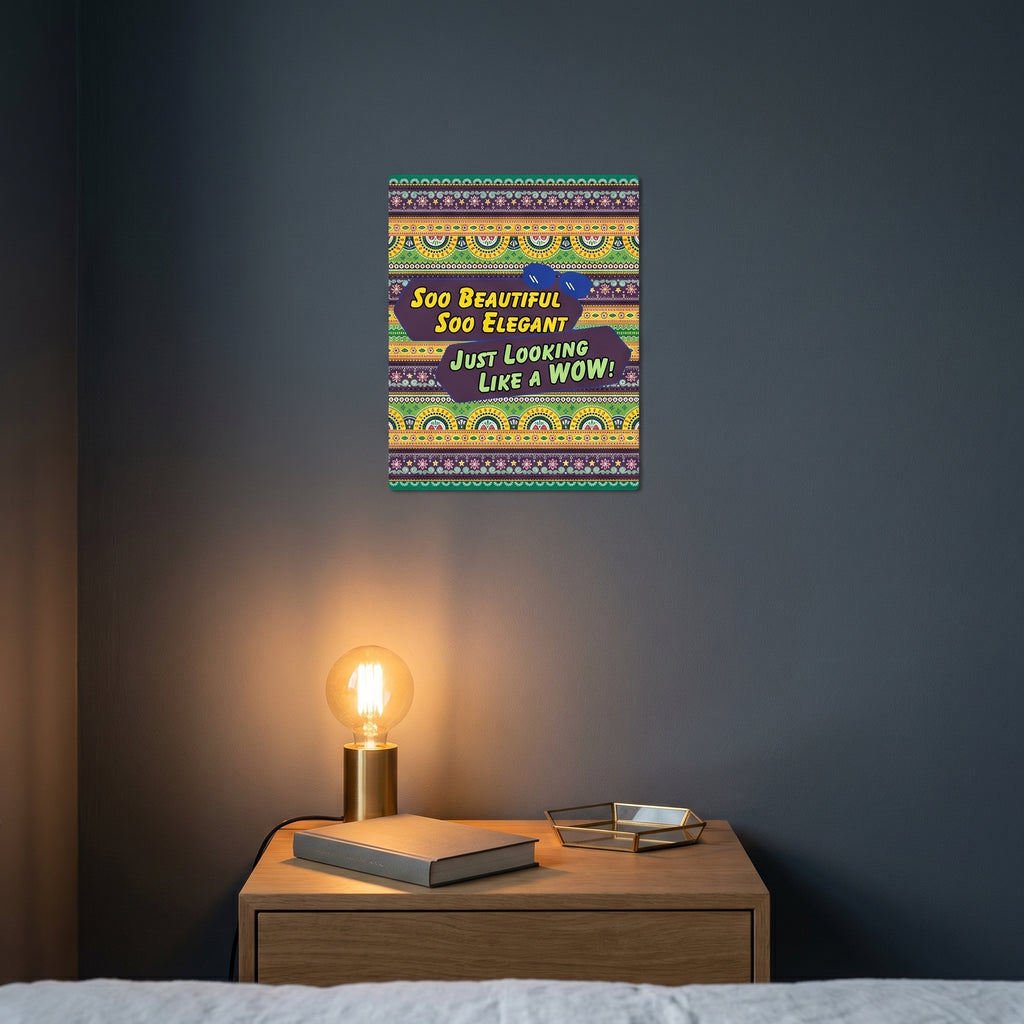 Vibrant pop art typography print catching warm ambient light from a lamp above a modern bedroom nightstand setup.