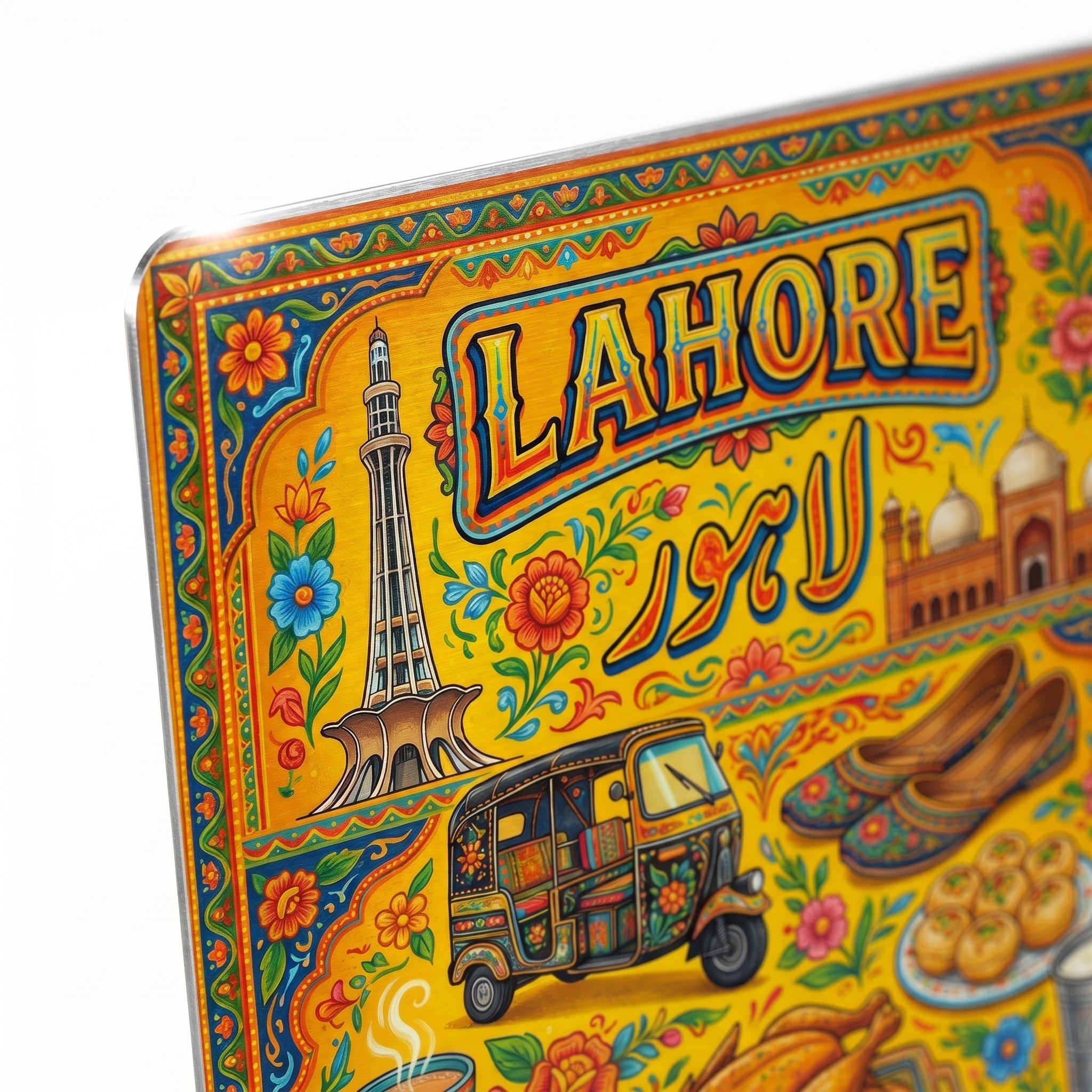 Close up detail of high-definition South Asian typography and intricate floral borders on a heavy matte art print.